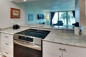 Condo, 1 King Bed with Sofa bed, Balcony, Pool View (#1B - No Pets) | Private kitchen