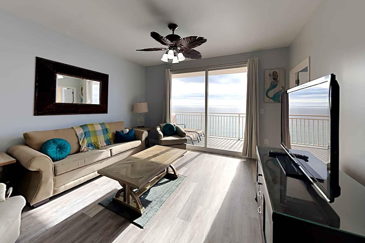 Condo, Multiple Beds, Balcony, Ocean View (#1106 East - No Pets) | Living area | TV