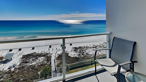 A balcony with a view of the ocean and beach. - Sterling Sands by Southern Vacation Rentals (Destin)