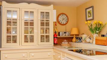 Fridge, electric kettle, toaster, cookware/dishes/utensils