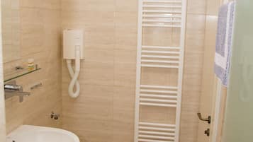 Shower, rainfall showerhead, hair dryer, towels
