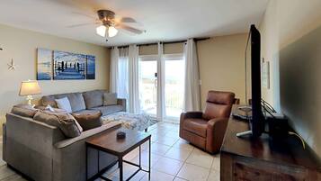 Condo, Multiple Beds, Balcony, Ocean View (#E - No Pets) | Living area | 40-inch TV with digital channels