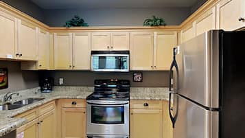 Condo, Multiple Beds, Balcony (#713 - No Pets Allowed) | Private kitchen | Fridge, microwave, oven, stovetop