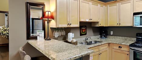 Condo, Multiple Beds, Balcony (#713 - No Pets) | Private kitchen | Fridge, microwave, oven, stovetop