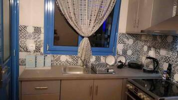 Apartment | Private kitchen | Fridge, microwave, oven, stovetop