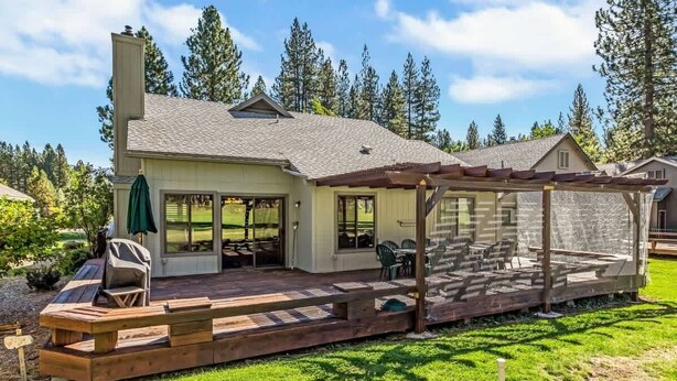 A house with a patio, outdoor seating, and a covered area. - Stunning on the 17th Fairway - 119 Cottonwood Dr (Blairsden)