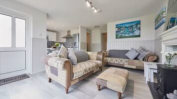 TV, fireplace, books, offices