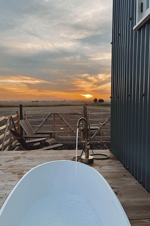 Property grounds. The Romney - a Shepherds Hut by Bloom Stays that sleeps 4 guests in 1 bedroom