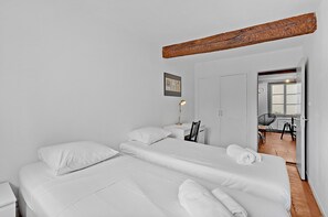 2 dormitorios, tabla de planchar con plancha, wifi gratis y ropa de cama