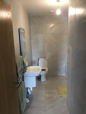 Apartment, 2 Queen Beds | Bathroom | Shower, deep soaking tub, towels