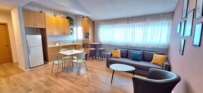 Family Suite | Private kitchen | Mini-fridge, microwave, stovetop, electric kettle