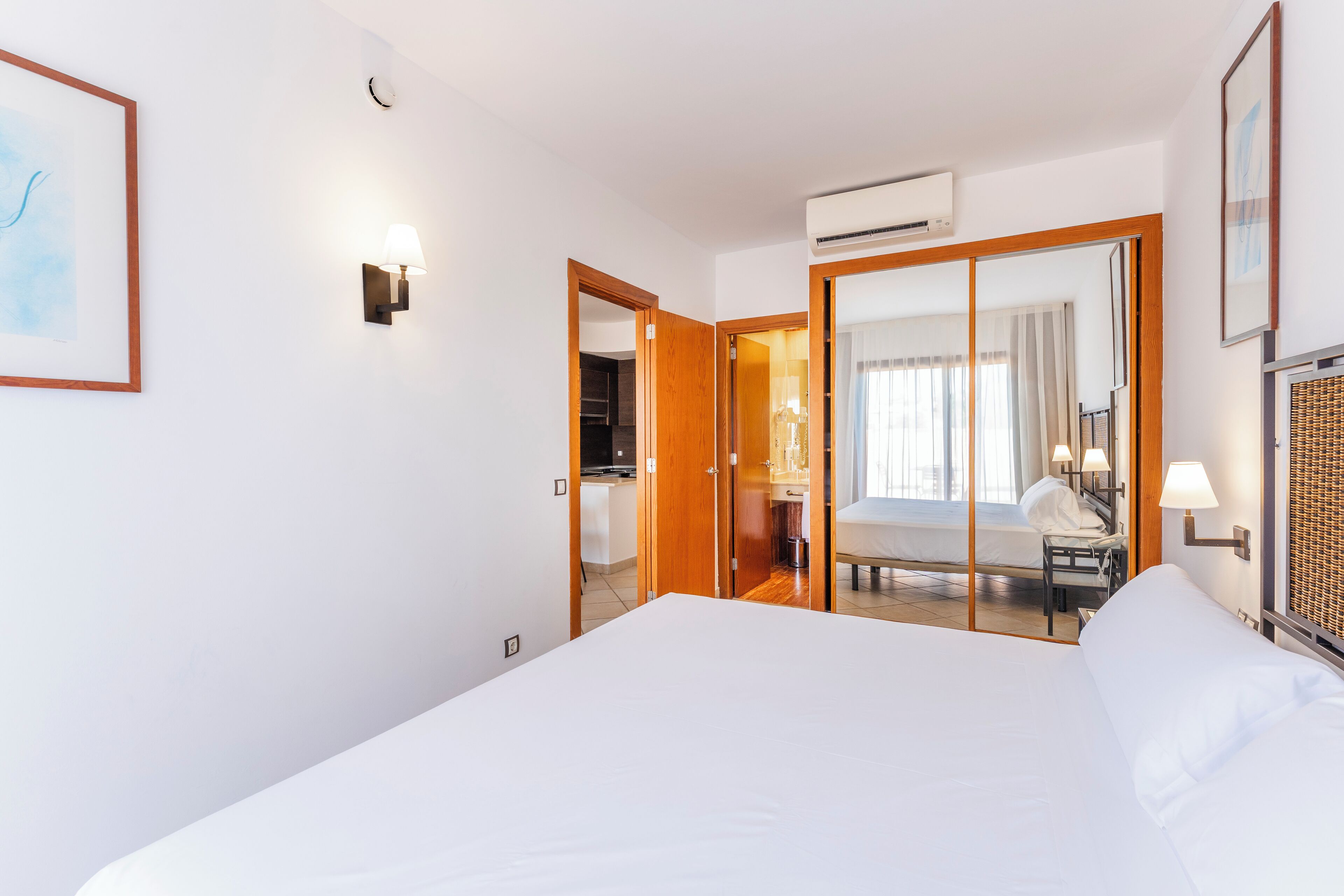 Premium bedding, down duvets, Select Comfort beds, in-room safe