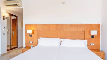 Premium bedding, down comforters, Select Comfort beds, in-room safe