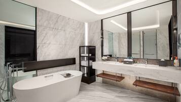 Suite, 1 Bedroom | Bathroom | Hair dryer, bathrobes, towels