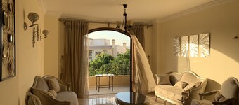 Modern downtown Sheikh Zayed Condo w/ rooftop patio
