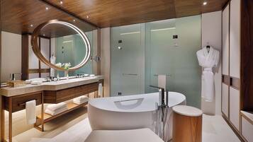 Separate tub and shower, rainfall showerhead, hair dryer, bathrobes