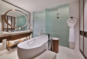 Separate tub and shower, rainfall showerhead, hair dryer, bathrobes
