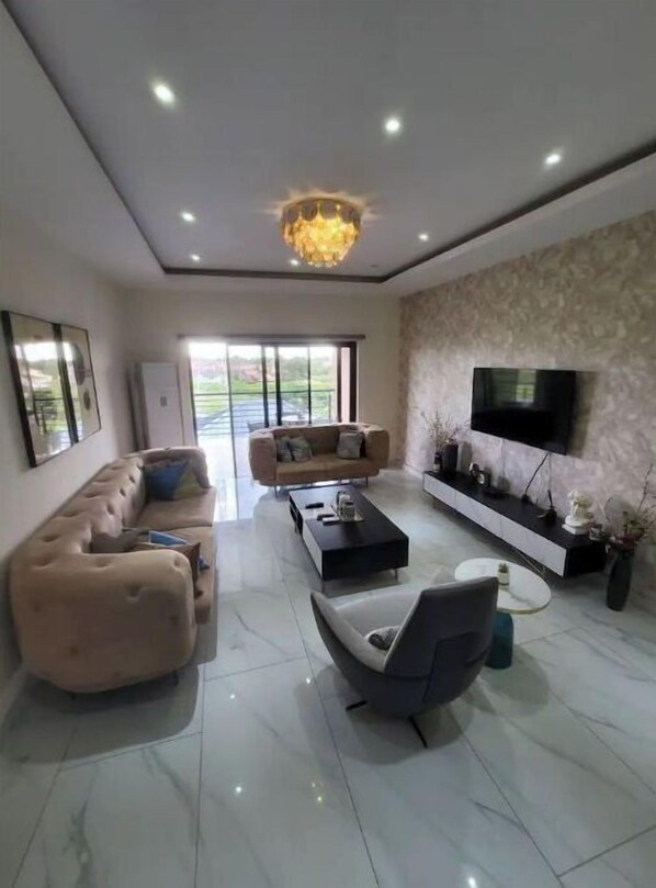 Living area - Stylish 2 Bedroom Penthouse #12 (Accra)