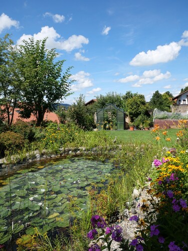 Vacation apartment with relaxation experience in the garden with terrace