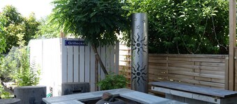 Vacation apartment with relaxation experience in the garden with terrace