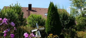 Vacation apartment with relaxation experience in the garden with terrace