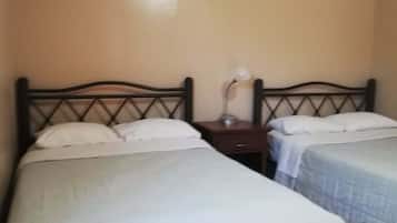 Departamento clásico, 2 camas Queen size | 1 habitación, tabla de planchar con plancha, wifi gratis y ropa de cama
