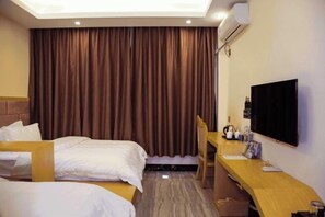 A hotel room with two beds, a desk, a chair, a TV, and a large window with curtains. - Beiliu Hyatt Hotel (Beiliu)
