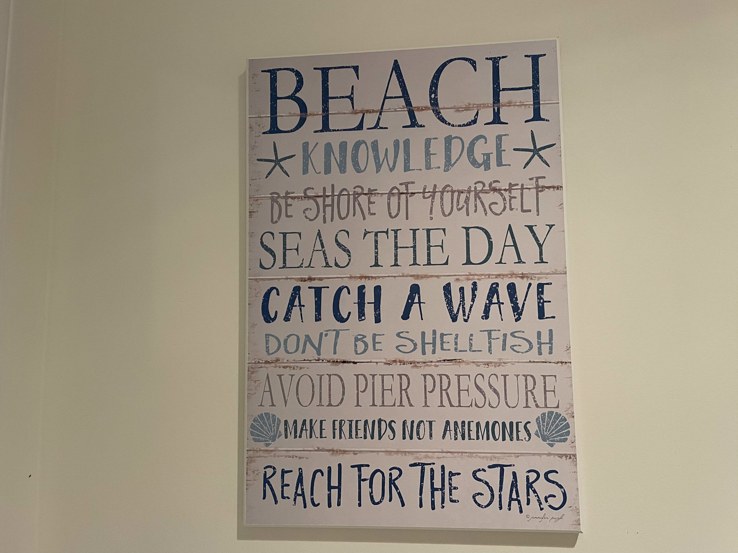 A wall with a motivational quote.