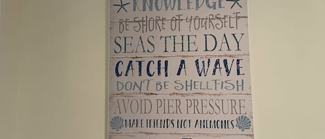 A wall with a motivational quote.