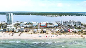 A coastal hotel with multiple buildings, a beach, and a pier. - Ocean View/Deeded Beach Access/Selfie Wall/Pets Ok! (Gulf Shores)