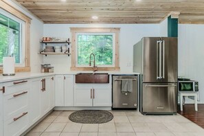 Fridge, microwave, oven, stovetop - Charming French-Country Home w/ Hot Tub & EV Charger Near Bruce Trail (Lion's Head)