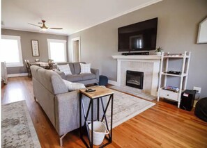Smart TV, fireplace, DVD player, books
