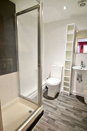Departamento Deluxe | Baño | Secadora de cabello y toallas 