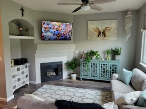 Smart TV, fireplace, table football, music library