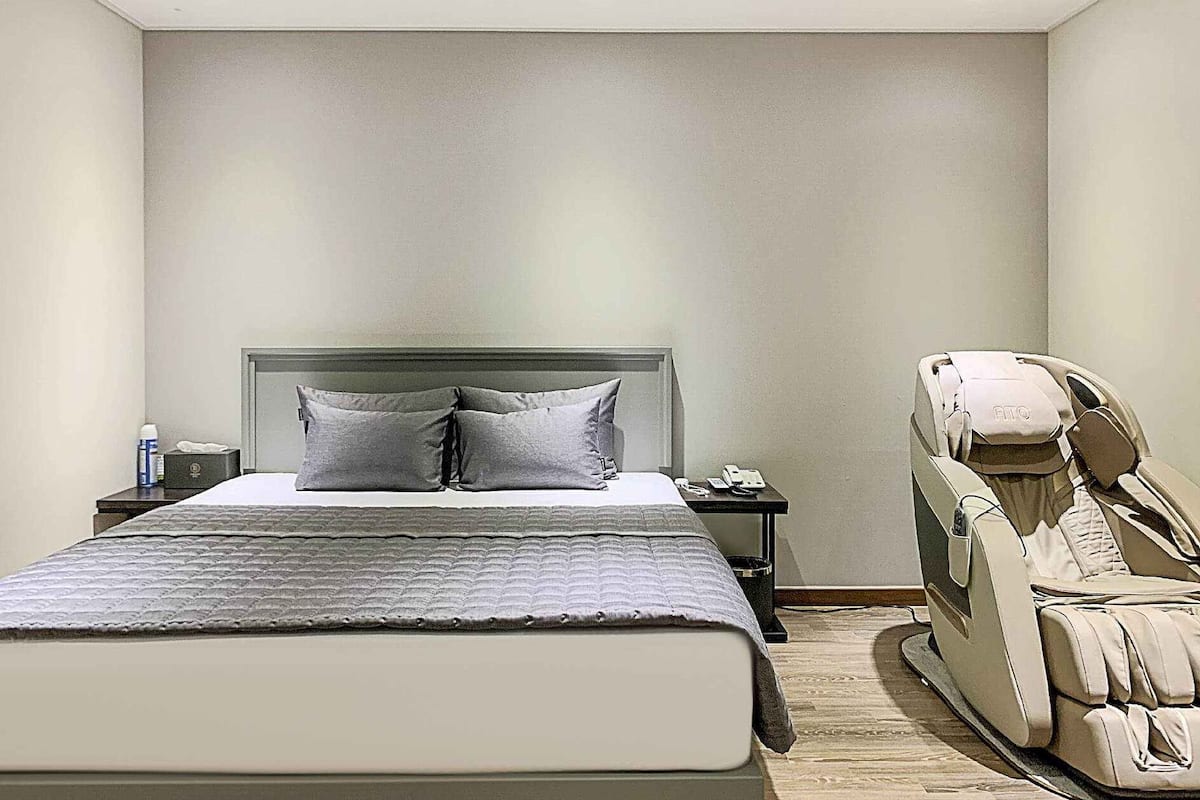 Premium bedding, down duvets, memory-foam beds, desk