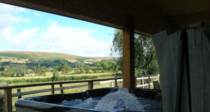 Woodland Lodge - A Five star luxury lodge with hot tub under cover.