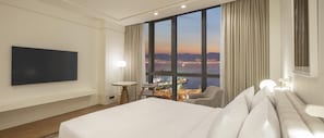 Roupas de cama premium, edredons de pluma, frigobar, cofres nos quartos