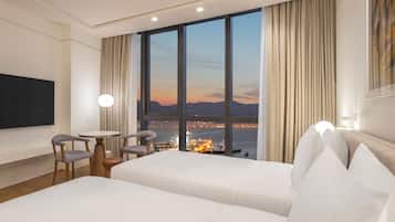 Premium bedding, down comforters, minibar, in-room safe