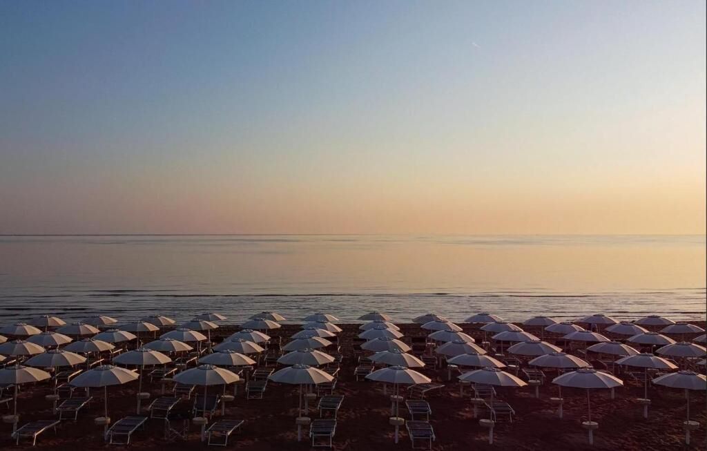 Sun-loungers, beach umbrellas