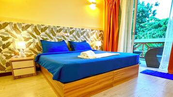 Habitación Deluxe | Minibar, caja fuerte, escritorio y sistema de insonorización