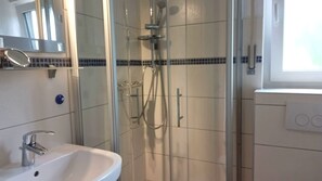 Shower, hair dryer, toilet paper