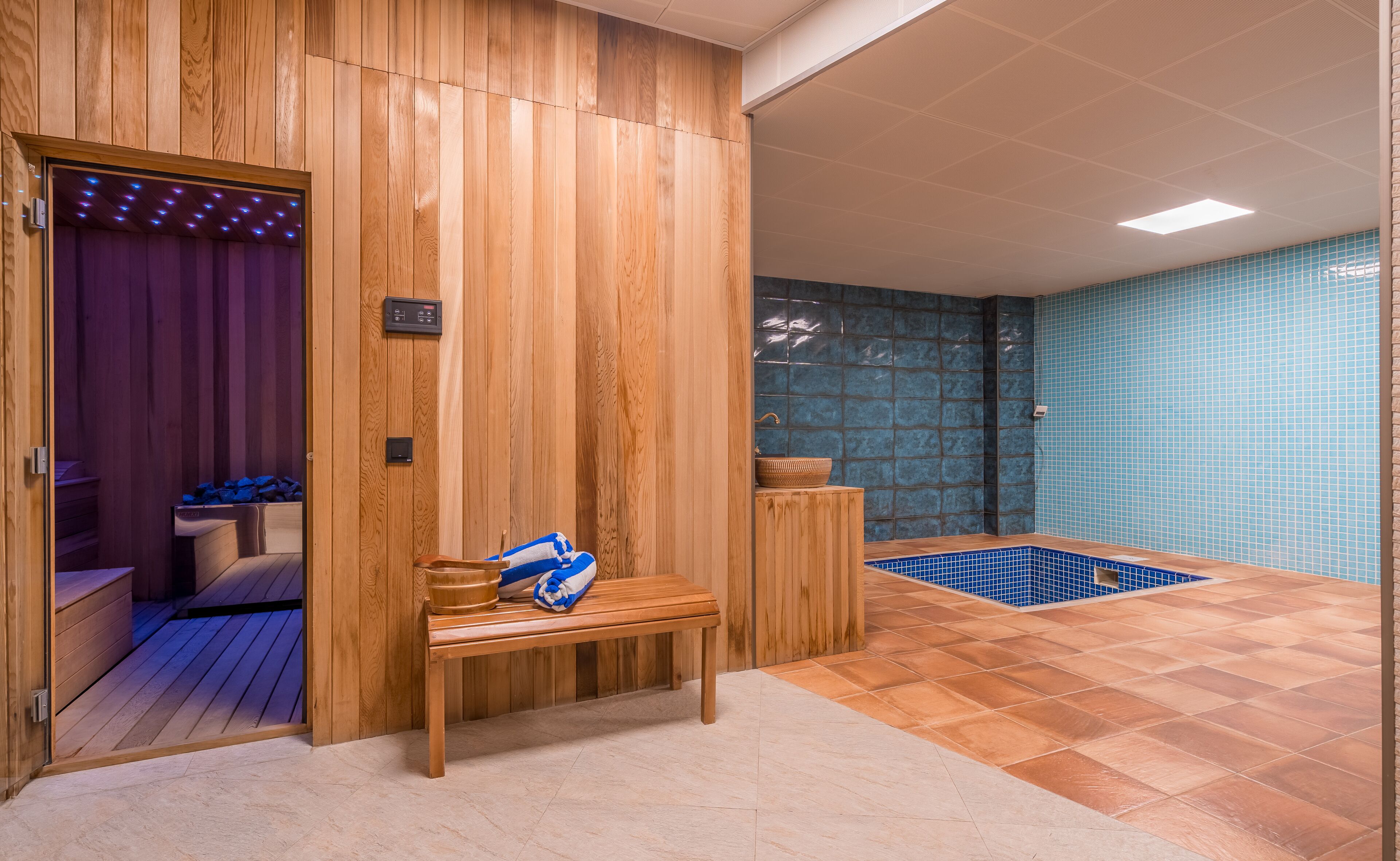 Sauna, hot tub, steam room, hot stone massages, deep-tissue massages