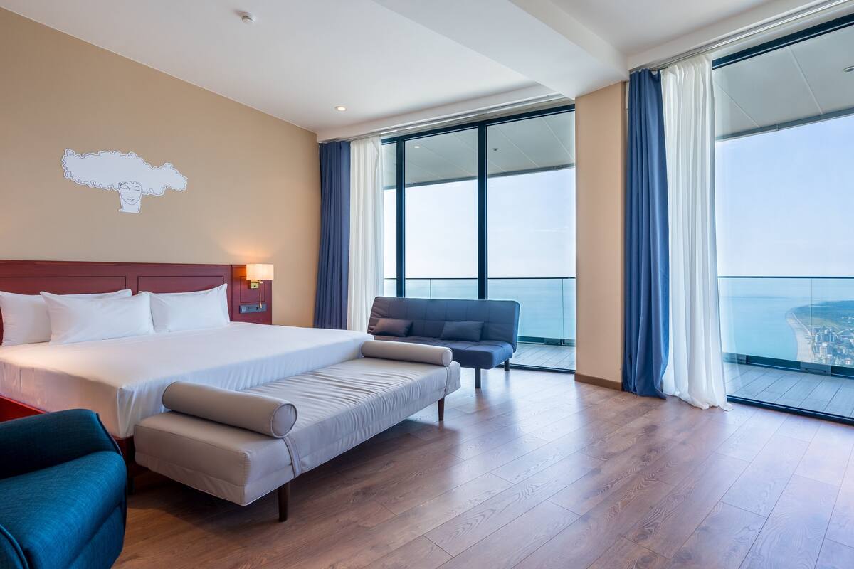 Premier King Room | Cofres nos quartos, espaço de trabalho para notebook, berços grátis
