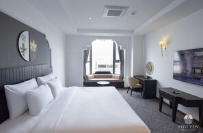 Luxe beddengoed, bedden met traagschuimmatrassen, een minibar