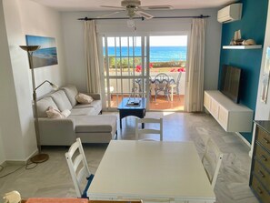 TV - Holiday Apartment Seafront with Sea View, Covered Terrace & Wi-Fi (Torrox)