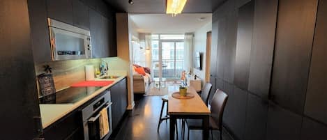 Coffee/tea maker, fridge, microwave, oven