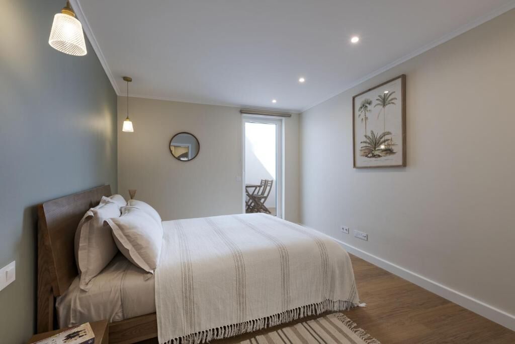 Cozy Apartment with Interior Terrace | In-room safe, blackout drapes, iron/ironing board, WiFi (free)