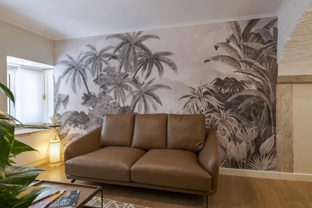 Cozy Apartment with Interior Terrace | Living area | 22-inch flat-screen TV with cable channels