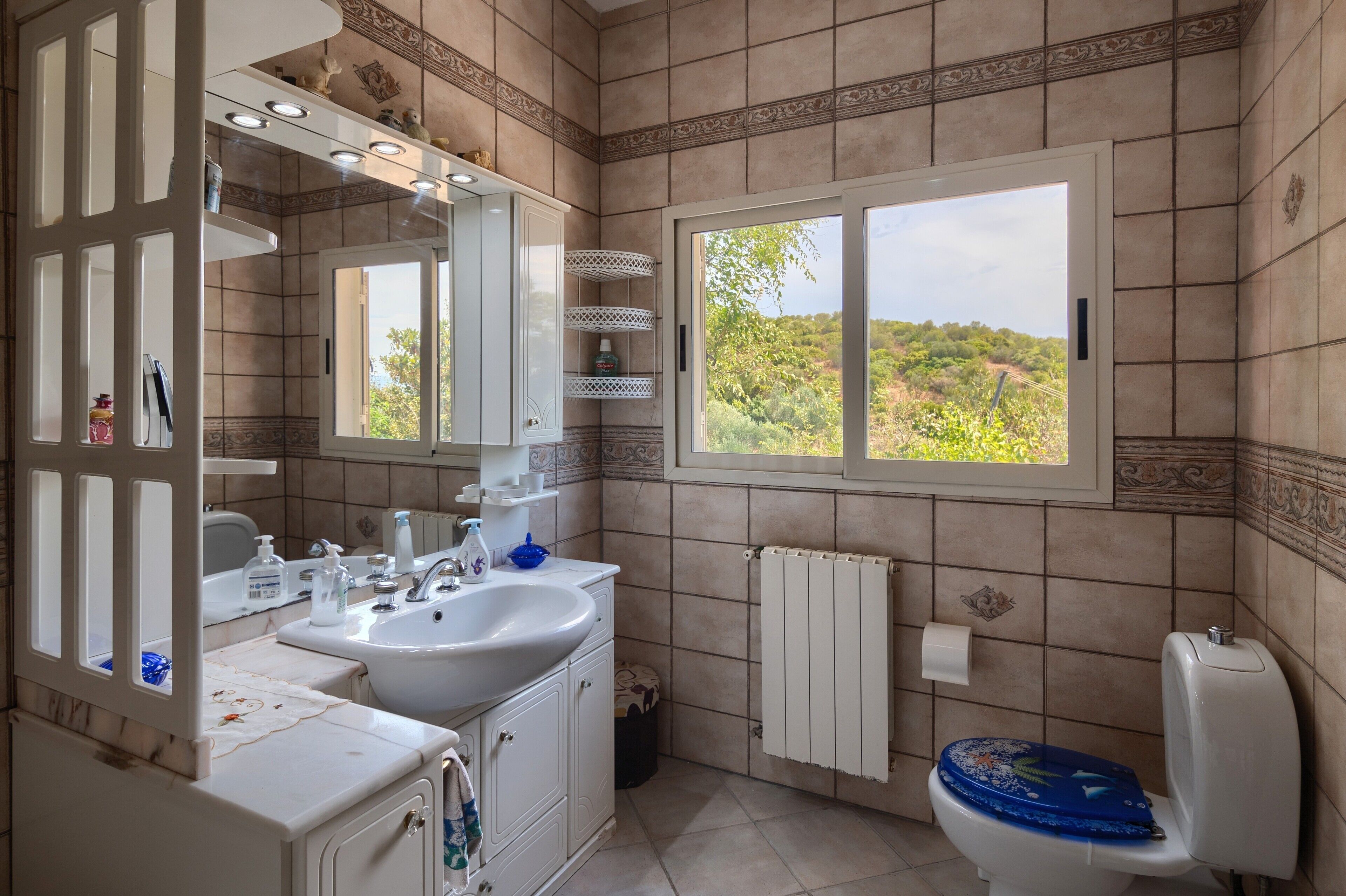 Bathtub, hair dryer, towels