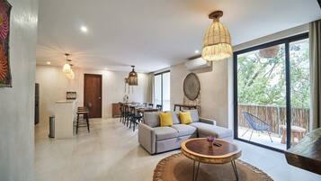 Deluxe Apartment, 2 Bedrooms | Living area | 32-inch Smart TV with digital channels, TV, streaming services